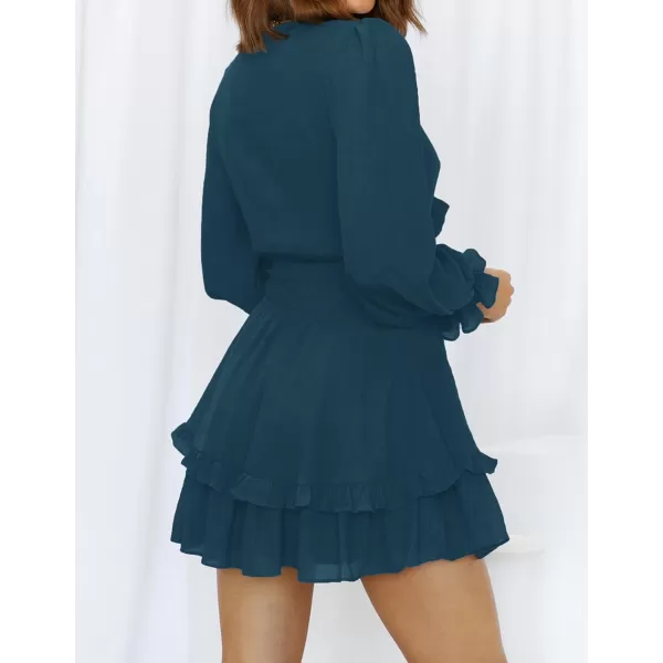 imageZESICA Womens Sexy Deep V Neck Knot Front Long Sleeve Smocked Wiast Ruffle Tiered Swing Mini Skater DressNavy