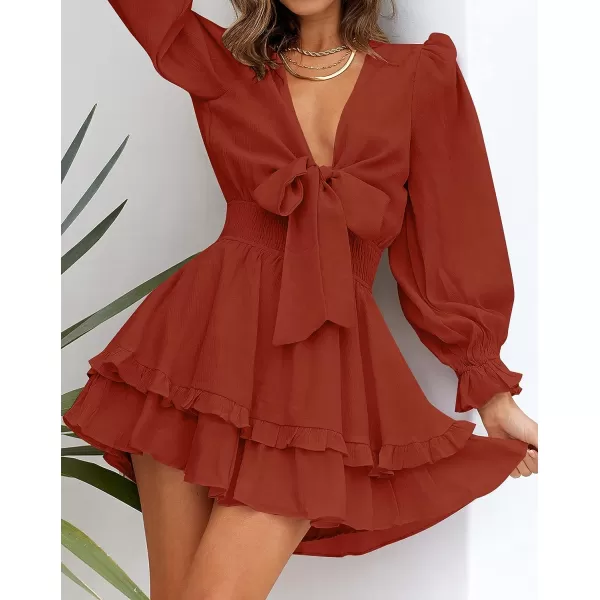 imageZESICA Womens Sexy Deep V Neck Knot Front Long Sleeve Smocked Wiast Ruffle Tiered Swing Mini Skater DressRust