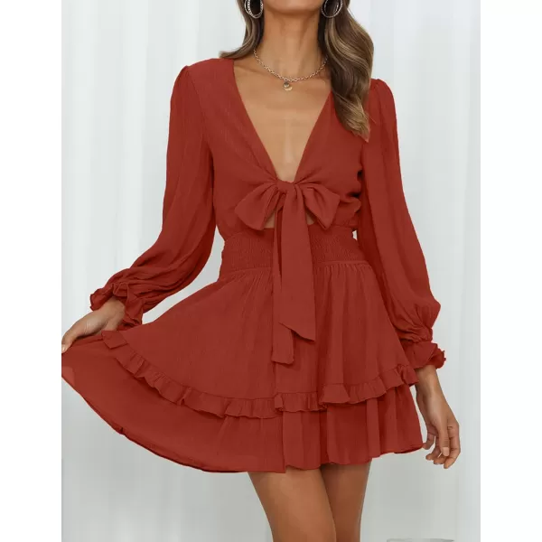 imageZESICA Womens Sexy Deep V Neck Knot Front Long Sleeve Smocked Wiast Ruffle Tiered Swing Mini Skater DressRust