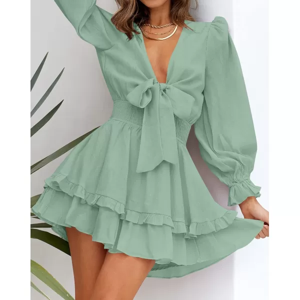 imageZESICA Womens Sexy Deep V Neck Knot Front Long Sleeve Smocked Wiast Ruffle Tiered Swing Mini Skater DressSage