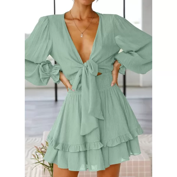 imageZESICA Womens Sexy Deep V Neck Knot Front Long Sleeve Smocked Wiast Ruffle Tiered Swing Mini Skater DressSage