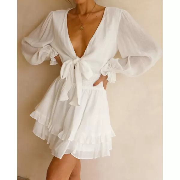 imageZESICA Womens Sexy Deep V Neck Knot Front Long Sleeve Smocked Wiast Ruffle Tiered Swing Mini Skater DressWhite