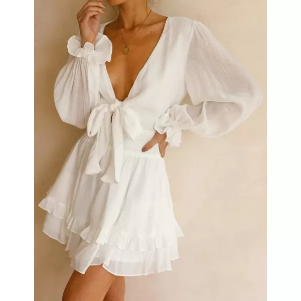 imageZESICA Womens Sexy Deep V Neck Knot Front Long Sleeve Smocked Wiast Ruffle Tiered Swing Mini Skater DressWhite