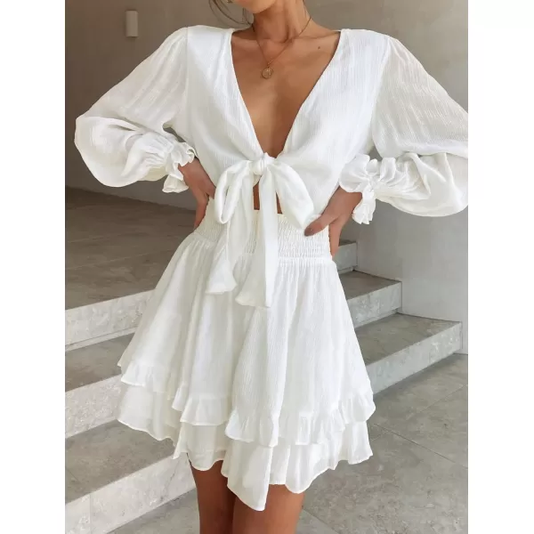imageZESICA Womens Sexy Deep V Neck Knot Front Long Sleeve Smocked Wiast Ruffle Tiered Swing Mini Skater DressWhite