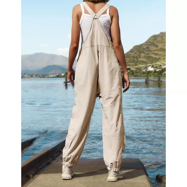 imageZESICA Womens Sleeveless Overalls Jumpsuit Casual Loose Adjustable Straps Bib Long Pant Jumpsuits with PocketsApricot