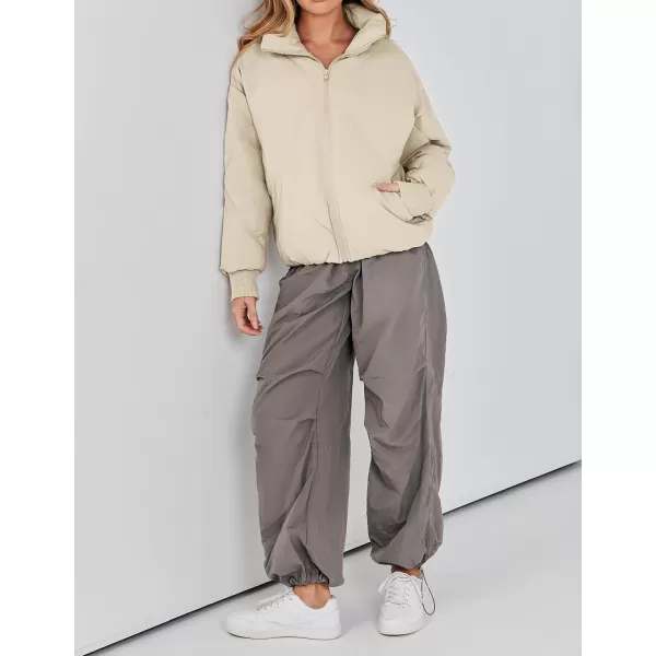 imageZESICA Womens Winter Cropped Puffer Jacket Long Sleeve Zip Up Quilted Short Down Coat with PocketsLightkhaki