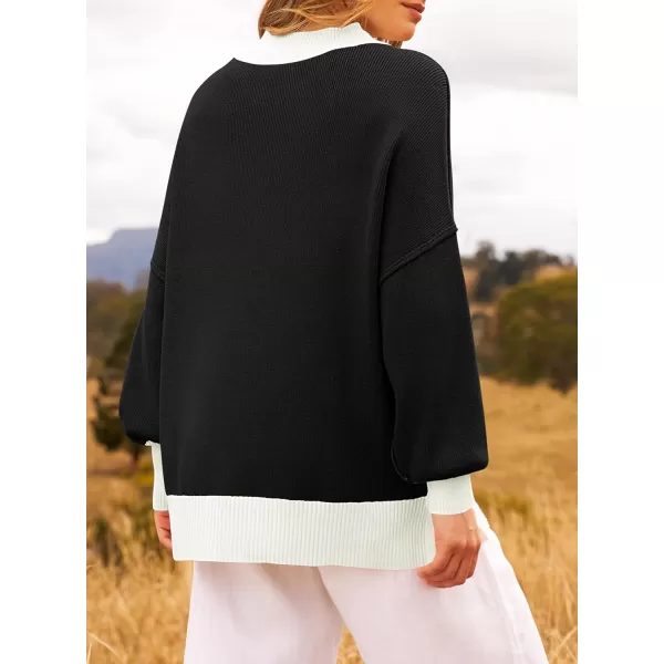 imageZESICA Womens Winter Oversized Sweaters Long Sleeve Color Block Mock Neck Side Slit Comfy Loose Knitted Pullover TopsBlack