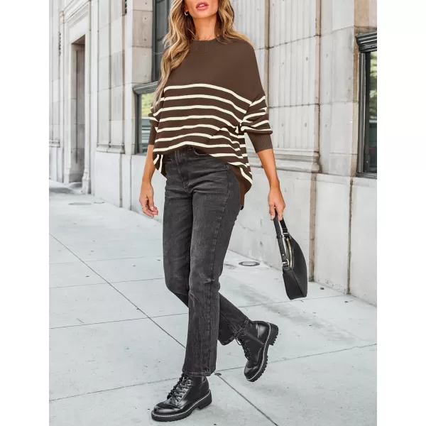 imageZESICA Womens Winter Oversized Sweaters Long Sleeve Color Block Mock Neck Side Slit Comfy Loose Knitted Pullover TopsCoffee