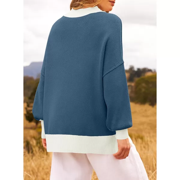 imageZESICA Womens Winter Oversized Sweaters Long Sleeve Color Block Mock Neck Side Slit Comfy Loose Knitted Pullover TopsDark Blue