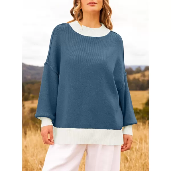imageZESICA Womens Winter Oversized Sweaters Long Sleeve Color Block Mock Neck Side Slit Comfy Loose Knitted Pullover TopsDark Blue