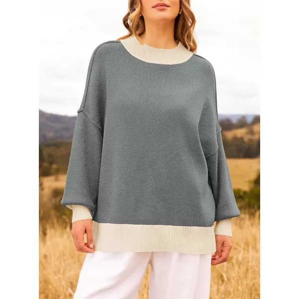 imageZESICA Womens Winter Oversized Sweaters Long Sleeve Color Block Mock Neck Side Slit Comfy Loose Knitted Pullover TopsDark Grey