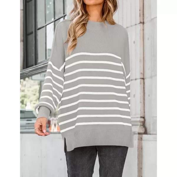 imageZESICA Womens Winter Oversized Sweaters Long Sleeve Color Block Mock Neck Side Slit Comfy Loose Knitted Pullover TopsLight Grey