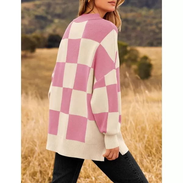 imageZESICA Womens Winter Oversized Sweaters Long Sleeve Color Block Mock Neck Side Slit Comfy Loose Knitted Pullover TopsPink