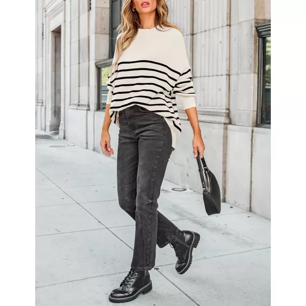 imageZESICA Womens Winter Oversized Sweaters Long Sleeve Color Block Mock Neck Side Slit Comfy Loose Knitted Pullover TopsWhite