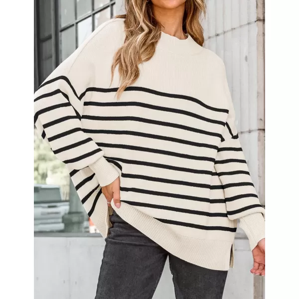 imageZESICA Womens Winter Oversized Sweaters Long Sleeve Color Block Mock Neck Side Slit Comfy Loose Knitted Pullover TopsWhite