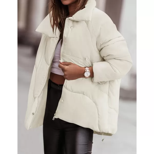 imageZESICA Womens Winter Puffer Jacket Long Sleeve Zip Up Drawstring Quilted Baggy Warm Short Down Coats with PocketsApricot