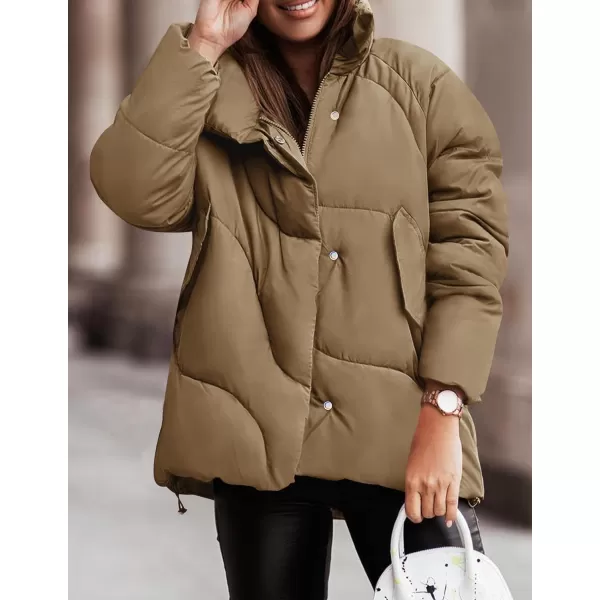 imageZESICA Womens Winter Puffer Jacket Long Sleeve Zip Up Drawstring Quilted Baggy Warm Short Down Coats with PocketsKhaki