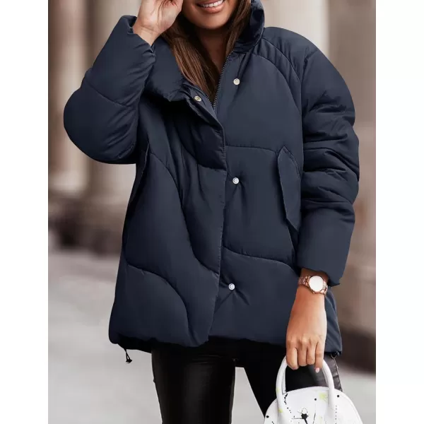 imageZESICA Womens Winter Puffer Jacket Long Sleeve Zip Up Drawstring Quilted Baggy Warm Short Down Coats with PocketsNavy