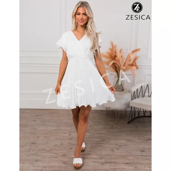 imageZESICA Womens Wrap V Neck Mini Dress 2023 Summer Flutter Sleeve Tie Waist Pleated A Line Swing Wedding Party Short DressesWhite