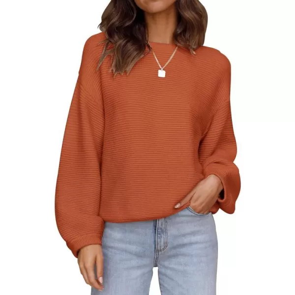 imageZESICA Womens 2023 Crew Neck Long Lantern Sleeve Casual Loose Ribbed Knit Solid Soft Pullover Sweater TopsOrange