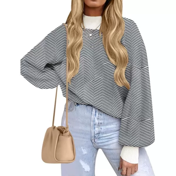 imageZESICA Womens 2023 Fall Fashion Turtleneck Long Sleeve Striped Ribbed Knit Loose Pullover Sweater TopsCarbon