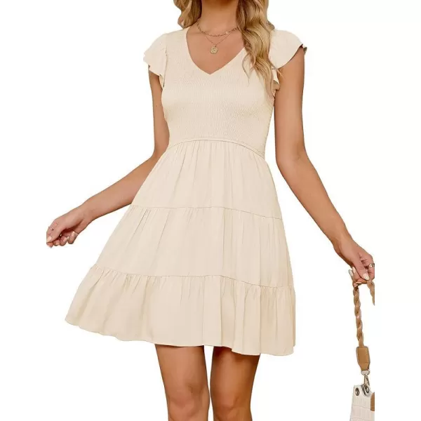 imageZESICA Womens 2023 Summer Casual V Neck Flutter Sleeve Bohemian Ruffle Smocked A Line Swing Mini DressBeige