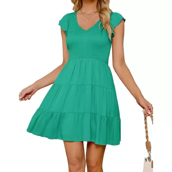 imageZESICA Womens 2023 Summer Casual V Neck Flutter Sleeve Bohemian Ruffle Smocked A Line Swing Mini DressGreen