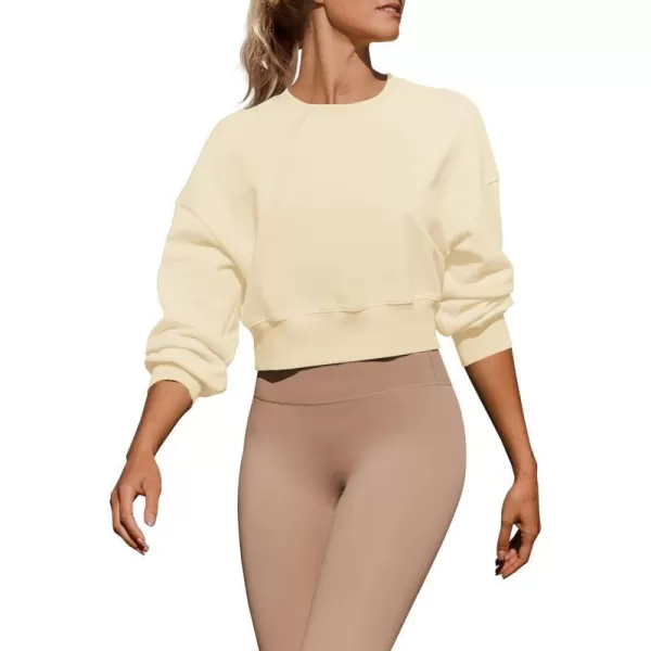 imageZESICA Womens 2024 Crop Sweatshirts Casual Long Sleeve Crewneck Solid Color Y2K Fleece Loose Pullover Sweatshirt TopsApricot
