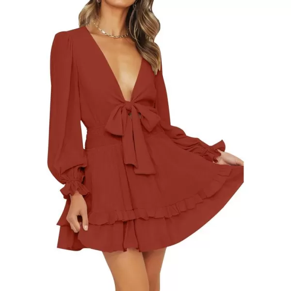 imageZESICA Womens Sexy Deep V Neck Knot Front Long Sleeve Smocked Wiast Ruffle Tiered Swing Mini Skater DressRust