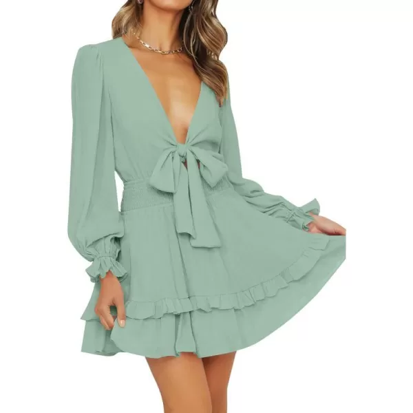 imageZESICA Womens Sexy Deep V Neck Knot Front Long Sleeve Smocked Wiast Ruffle Tiered Swing Mini Skater DressSage