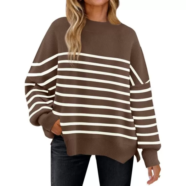 imageZESICA Womens Winter Oversized Sweaters Long Sleeve Color Block Mock Neck Side Slit Comfy Loose Knitted Pullover TopsCoffee