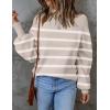 imageZESICA Womens Fall Fashion Turtleneck Long Sleeve Striped Ribbed Knit Loose Pullover Sweater TopsAlmond