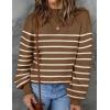 imageZESICA Womens 2025 Fall Fashion Turtleneck Long Sleeve Striped Ribbed Knit Loose Pullover Sweater TopsTan